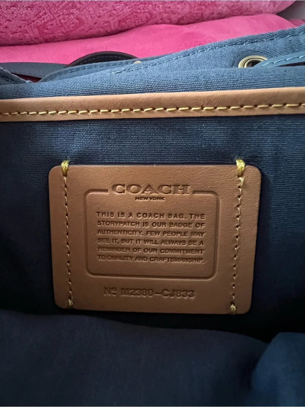 COACH denim riya 21 backpack